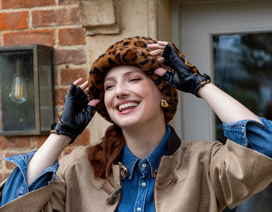 Woman wearing animal print bucket hat
